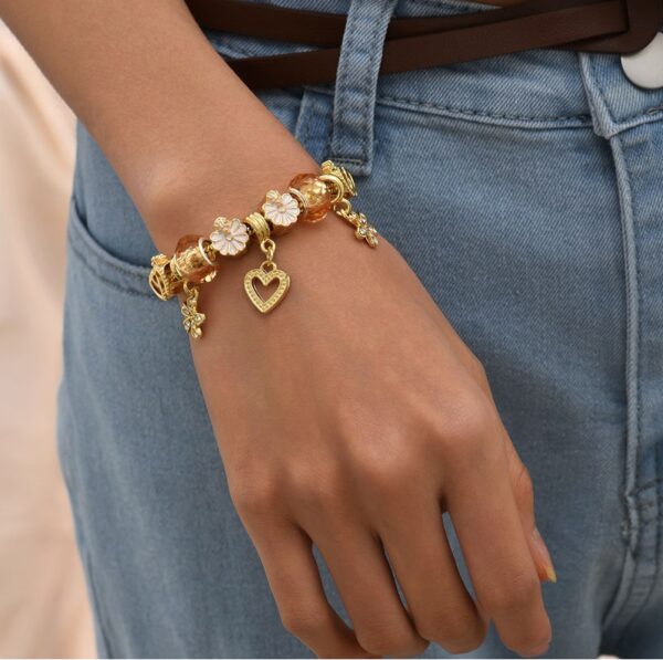 Pulsera Elegante De Corazón Y Flor - Imagen 2