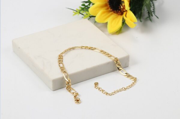 Pulsera Ara En Acero Inoxidable Con Baño En Oro De 18k