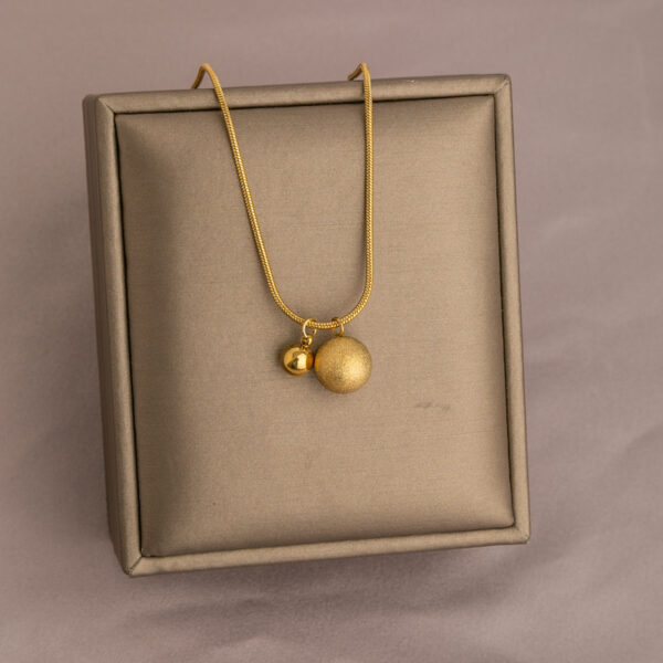Collar Doble Esfera En Acero Titanio