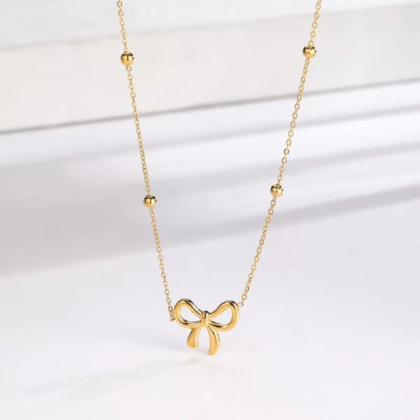 Collar De Lazo En Acero Titanio Chapada En Oro - Imagen 5