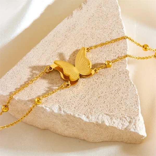 Pulsera Mariposa Acero Titanio Chapados en oro de 18k - Imagen 2