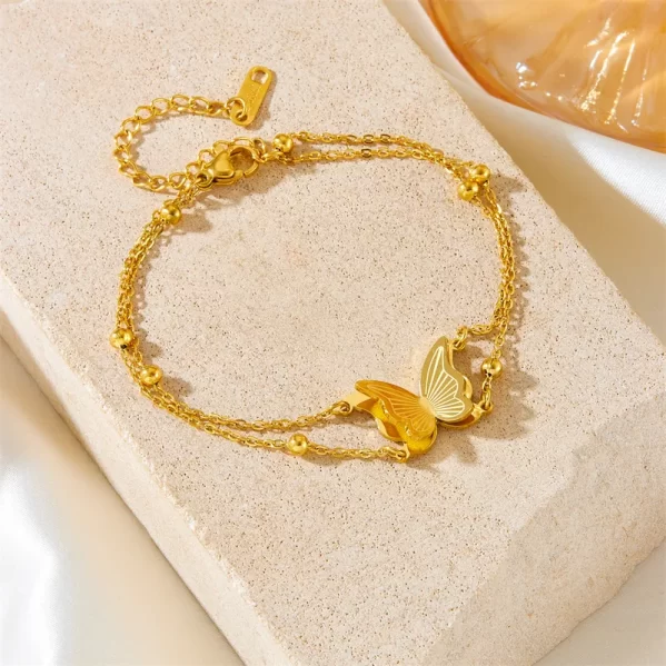 Pulsera Mariposa Acero Titanio Chapados en oro de 18k