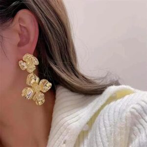 Bloom Duo Shine – Aretes Colgantes Doble Flor en Cobre Pulido Chapado en Oro 18K Oro