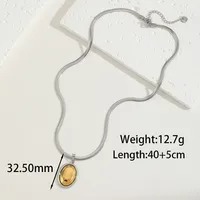 Medallón Dual – Acero Inoxidable Chapado 18K - Imagen 2