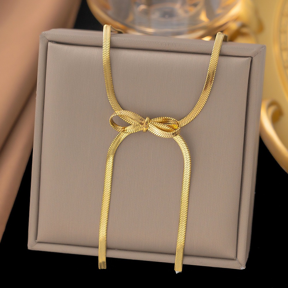 Collar Moño Cinta Metálica – Acero de Titanio Enchapado